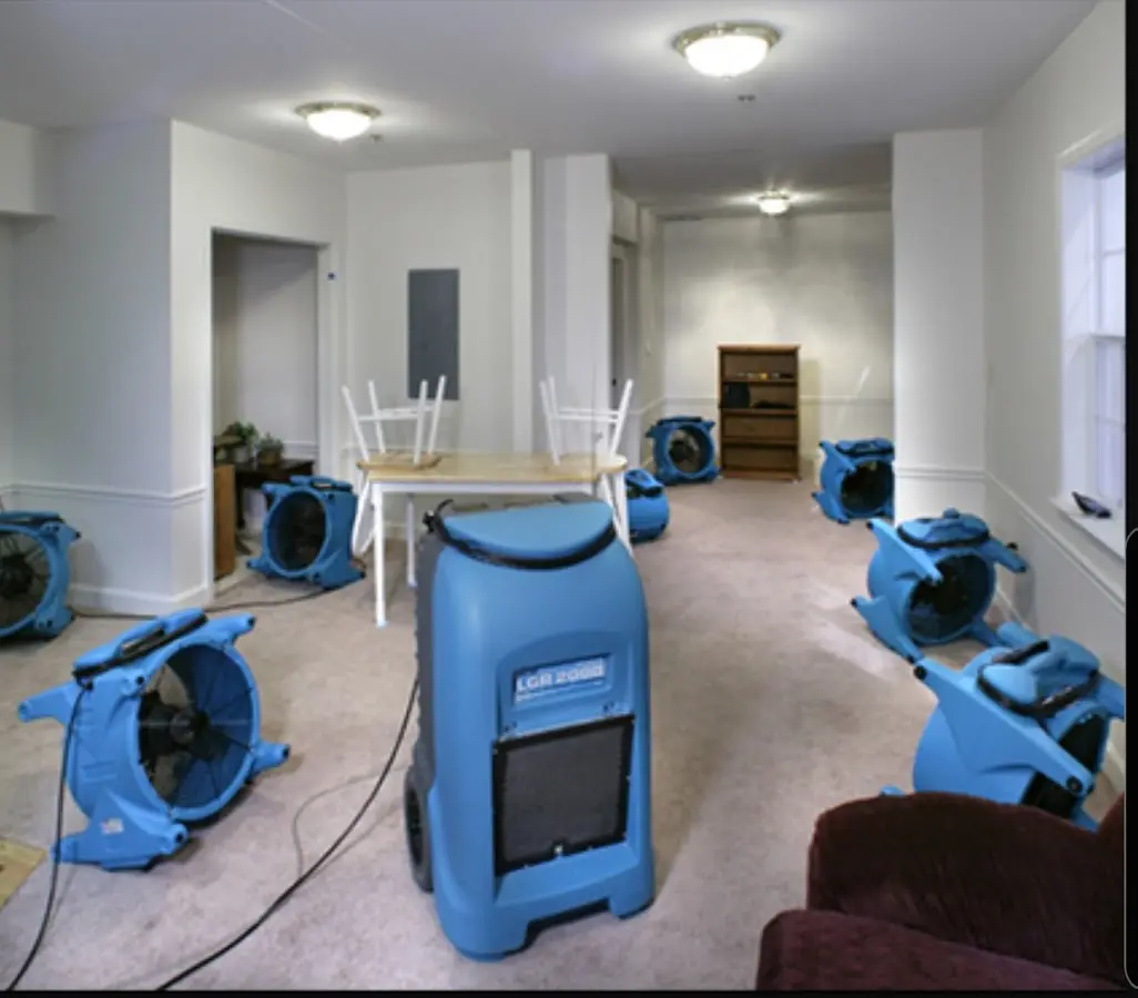 Air movers and dehumidifier setup for Water Damage Restoration in Town 'n' Country